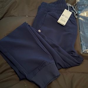 Selling 2 Navy size Medium Tall Figs bottoms (2 pairs of jogger pants).